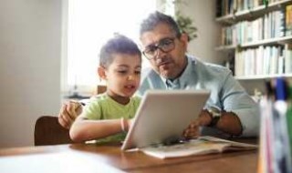 Man and boy using tablet